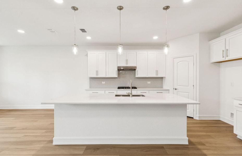 Roomy kitchen designed for functionality and comfort, with plenty of workspace  *Real home pictured