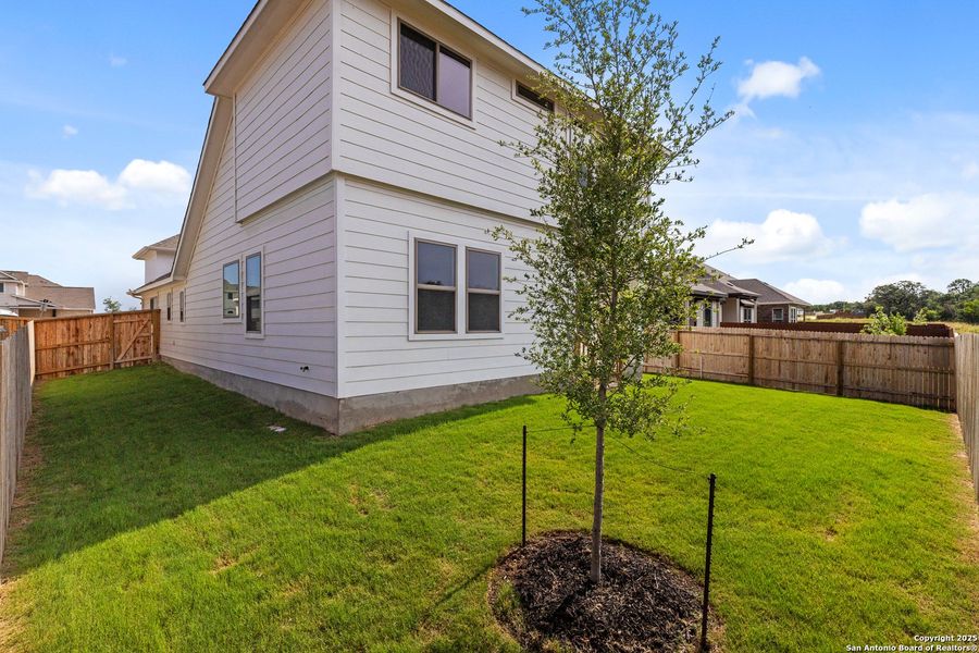Exterior details and patio area of a home in Megan's Landing, Castroville (Image 2).