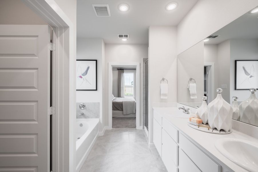 Representative furnished interior of a home built from the Caddo by Tri Pointe Homes in Mason Woods, Cypress (Image 8).