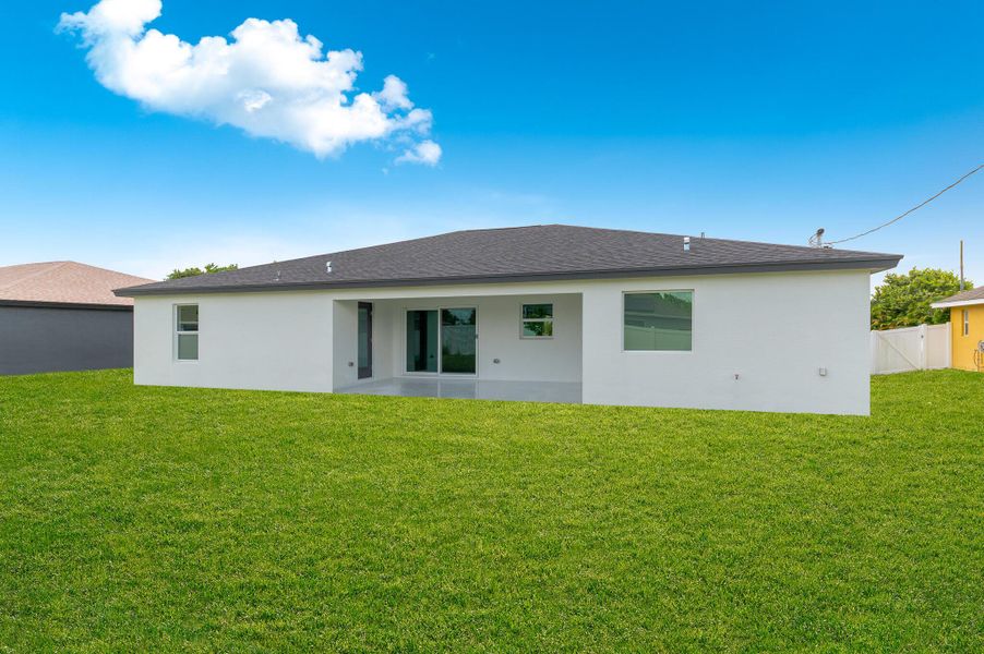 Front exterior of a new home in , Port St. Lucie, FL, highlighting curb appeal (Image 22). Front exterior of a new home in , Port St. Lucie, FL, highlighting curb appeal (Image 22).