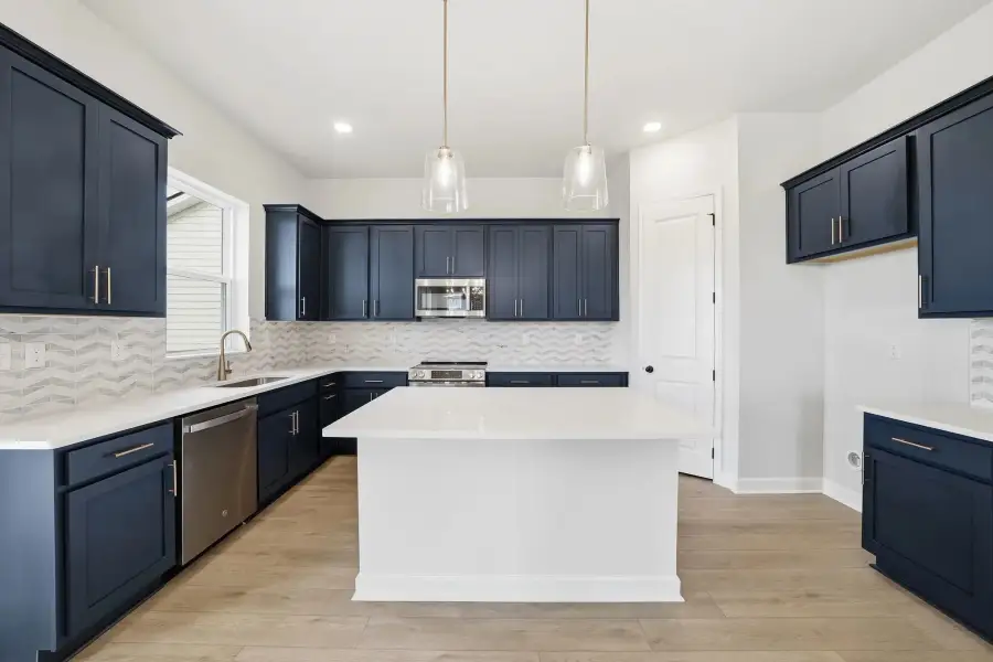 Sample Kitchen photo. Actual structural options and design finishes of home may vary.