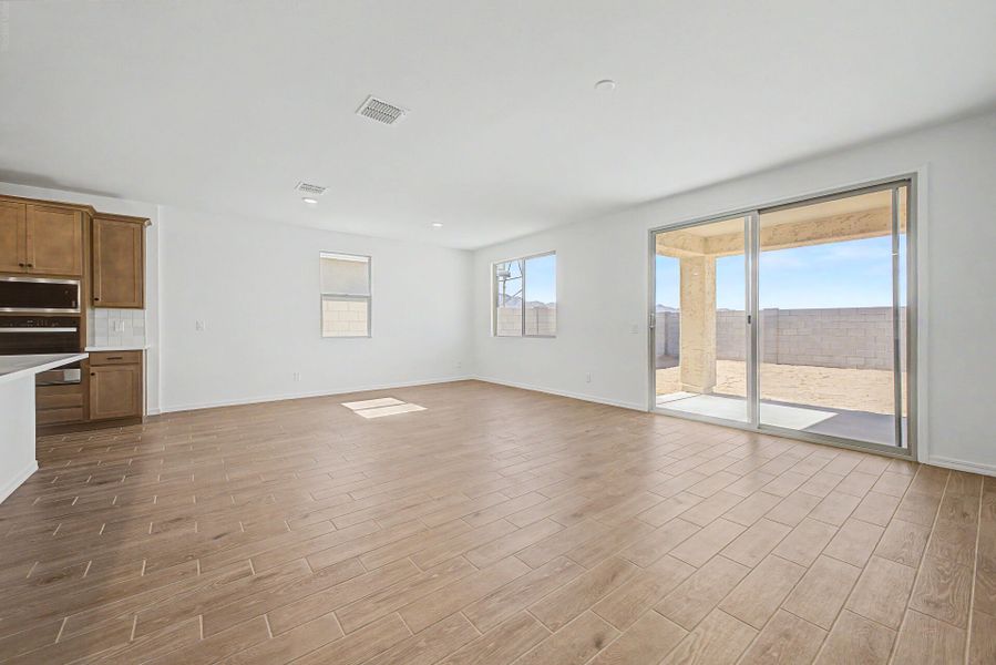 Spacious, unfurnished interior of a new home in White Tank Vistas, Waddell (Image 8). Spacious, unfurnished interior of a new home in White Tank Vistas, Waddell (Image 8).