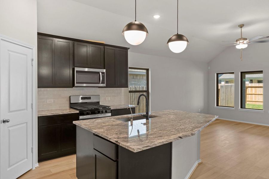 Furnished interior view inside a new home in Grand Central Park, Conroe (Image 7).