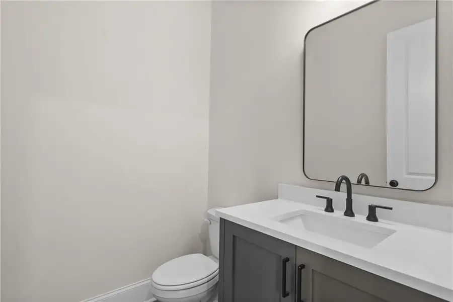 Furnished interior view inside a new home in Bellwyn, Johns Creek (Image 3).