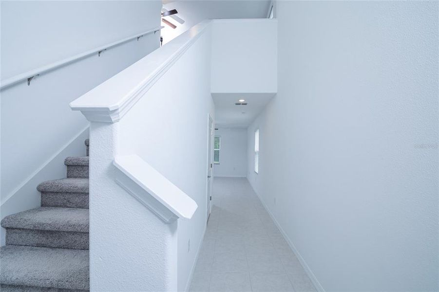 Spacious, unfurnished interior of a new home in Saddle Creek Preserve: The Manors II, Lakeland (Image 49).