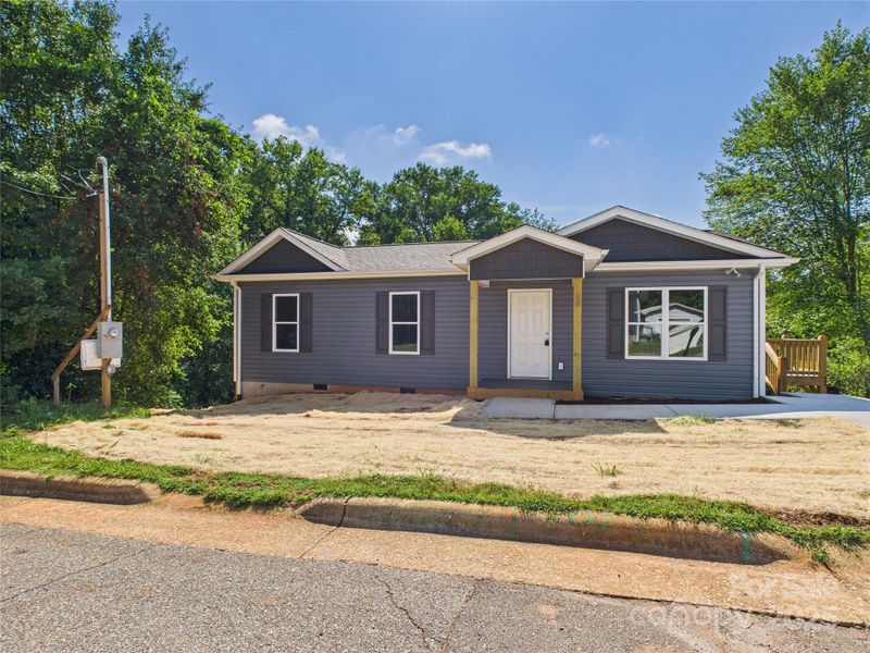 Front exterior of a new home in , Granite Falls, NC, highlighting curb appeal (Image 21).