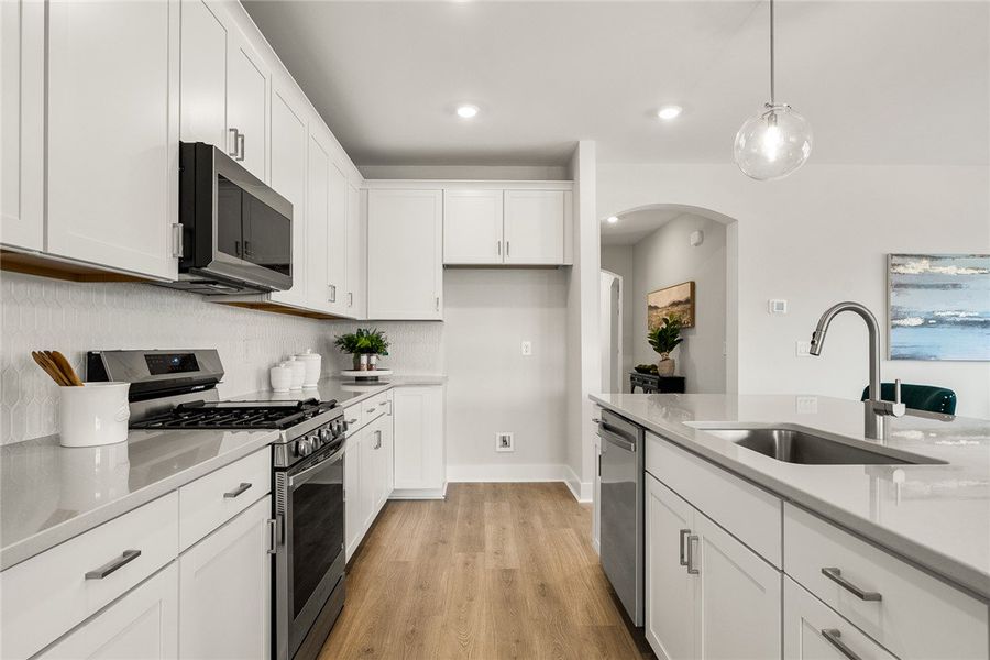 Culinary adventures await in this kitchen featurin Culinary adventures await in this kitchen featurin