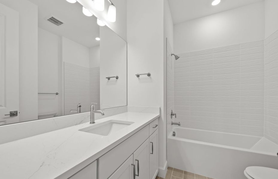 Representative furnished interior of a home built from the Concord by DiVosta in Talon Preserve on Palmer Ranch, Nokomis (Image 16).