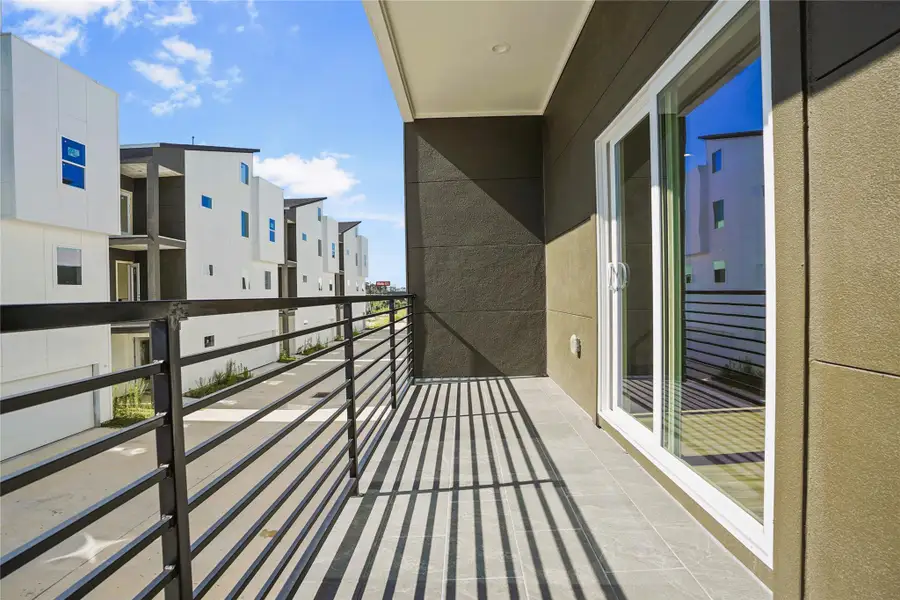 Exterior details and patio area of a home in , Houston (Image 3).