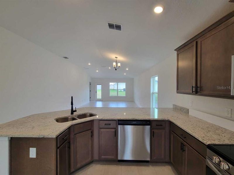 Furnished interior view inside a new home in Ocala Crossings South, Ocala (Image 5).