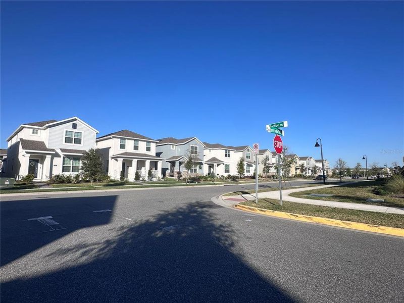 House is the first one on the left. Community Center after last house on the right.