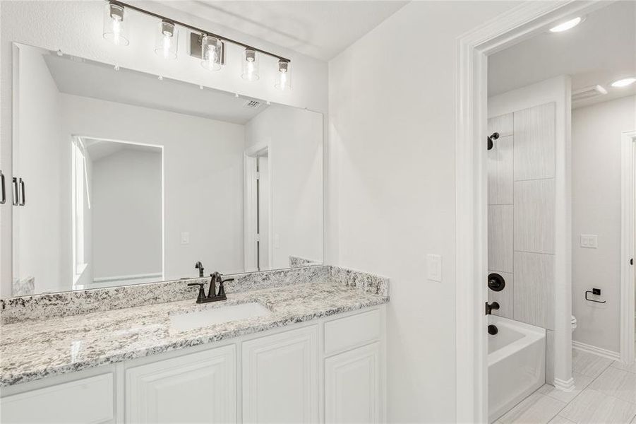 Furnished interior view inside a new home in Chaparral Park, Oak Point (Image 14). Furnished interior view inside a new home in Chaparral Park, Oak Point (Image 14).