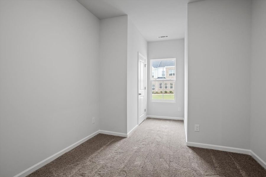 Spacious, unfurnished interior of a new home in Renaissance at White Oak, Garner (Image 18).
