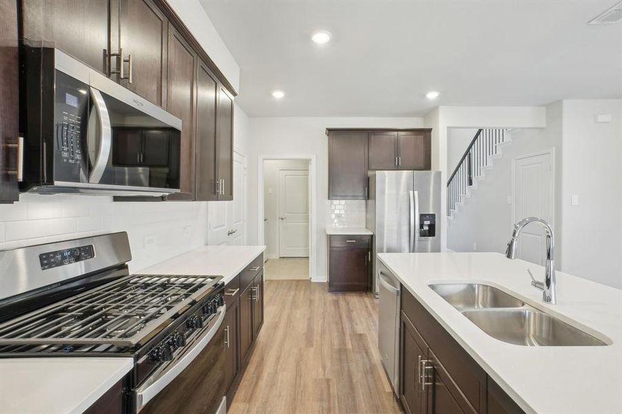 Photo is not of the actual home, but is an inspirational photo of builder’s model home and may depict options, furnishings, and/or decorator features that are not included.