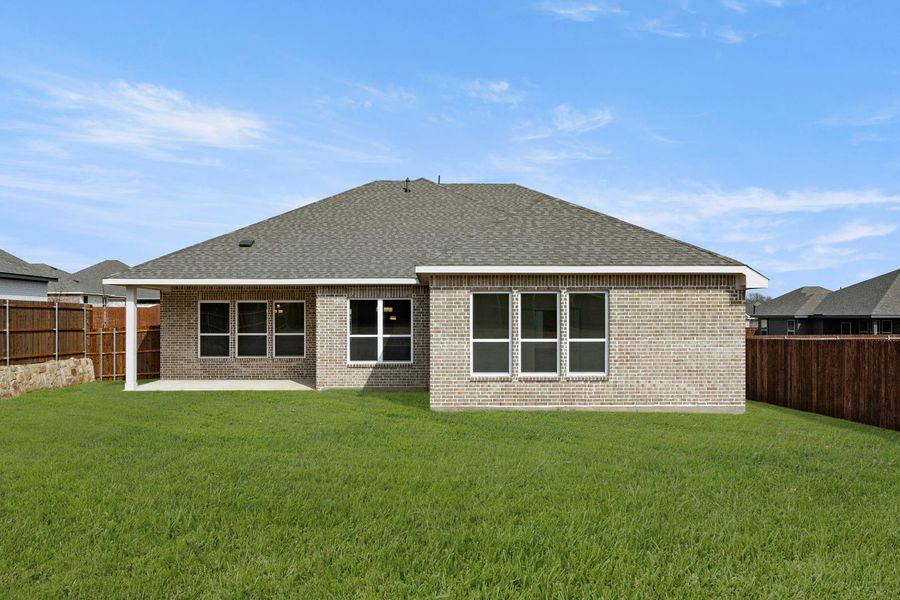 Exterior details and patio area of a home in Stone Eagle, Azle (Image 4).