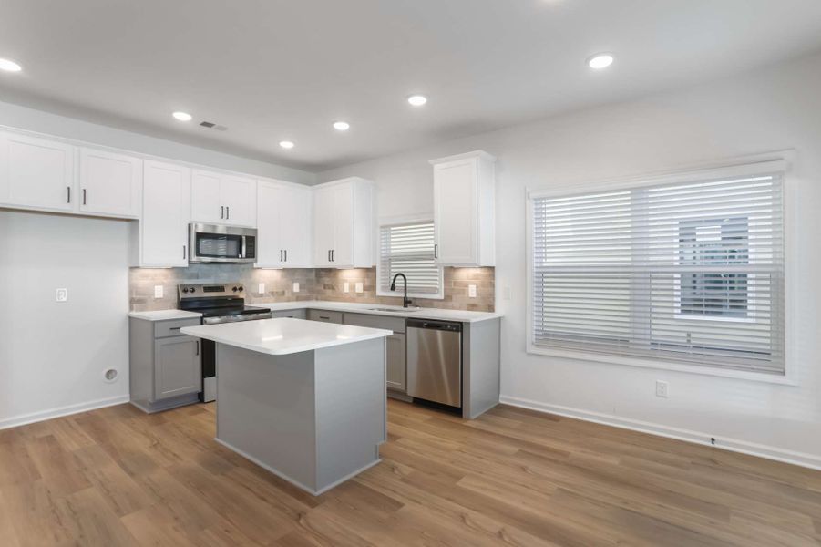 Representative furnished interior of a home built from the Khloe by KM Homes in The Cottages at Jackson Heights, Cleveland (Image 8).