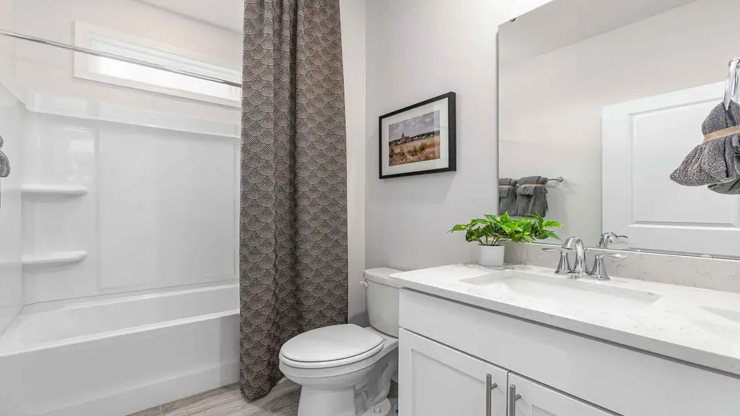 Furnished interior view inside a new home in The Villas at Kinsley, Jamestown (Image 7).