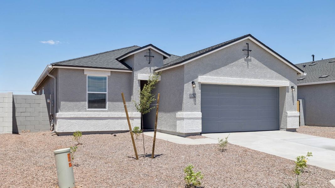 Front exterior of a new home in Quail Ranch, San Tan Valley, AZ, highlighting curb appeal (Image 2). Front exterior of a new home in Quail Ranch, San Tan Valley, AZ, highlighting curb appeal (Image 2).