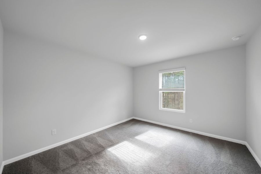 Spacious, unfurnished interior of a new home in Monroe Preserve, Chapin (Image 35).