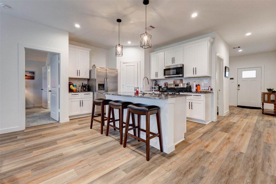 Furnished interior view inside a new home in Canterra Creek 45' and 50' Homesites, Iowa Colony (Image 10).
