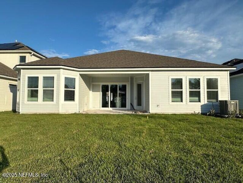 Exterior details and patio area of a home in Holly Landing at SilverLeaf, St. Augustine (Image 3). Exterior details and patio area of a home in Holly Landing at SilverLeaf, St. Augustine (Image 3).