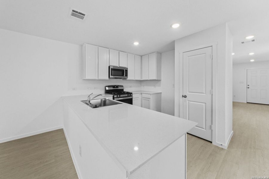 Furnished interior view inside a new home in Spring Grove, St. Hedwig (Image 5).