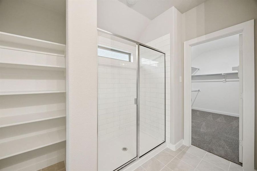 Primary Bathroom in the Oscar home plan by Trophy Signature Homes – REPRESENTATIVE PHOTO Primary Bathroom in the Oscar home plan by Trophy Signature Homes – REPRESENTATIVE PHOTO