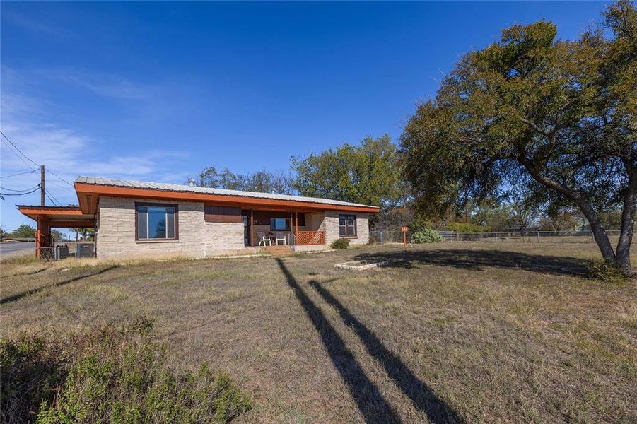 Exterior details and patio area of a home in , Brownwood (Image 17).