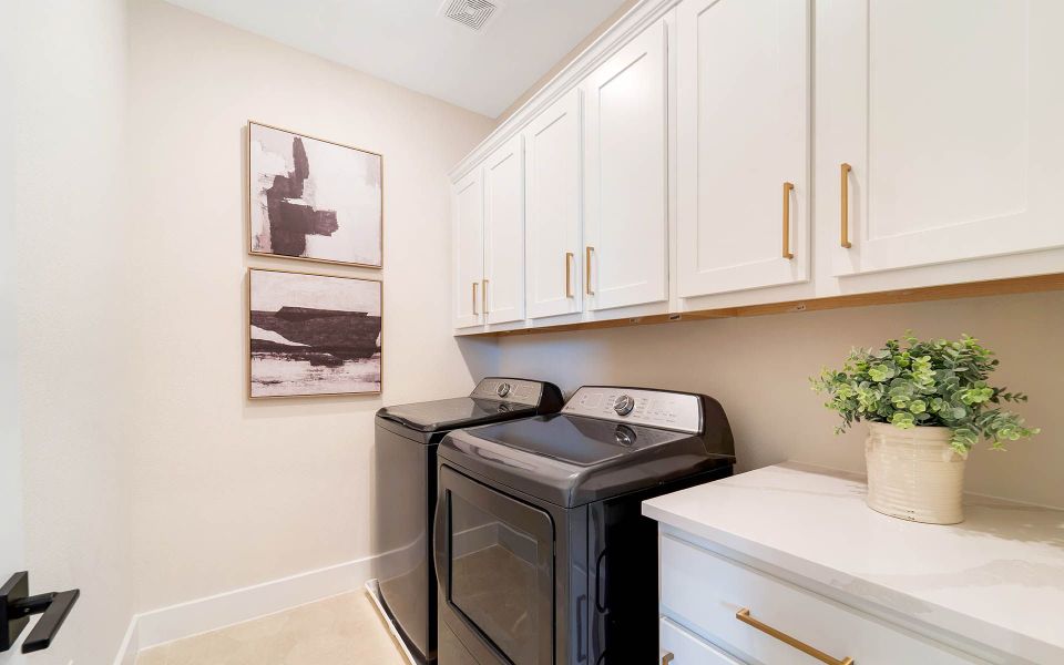 Representative furnished interior of a home built from the Rainier by CastleRock Communities in The Summit at Center Stage, Keller (Image 24).