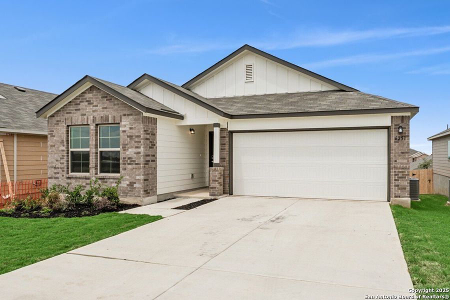 Front exterior of a new home in Mesquite Ridge, San Antonio, TX, highlighting curb appeal (Image 22). Front exterior of a new home in Mesquite Ridge, San Antonio, TX, highlighting curb appeal (Image 22).