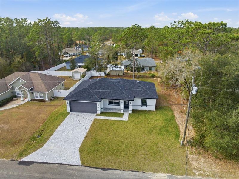 Front exterior of a new home in , Citrus Springs, FL, highlighting curb appeal (Image 19). Front exterior of a new home in , Citrus Springs, FL, highlighting curb appeal (Image 19).