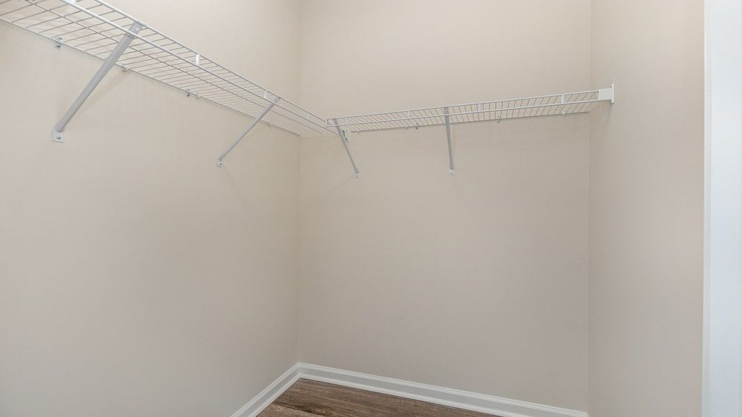 Spacious, unfurnished interior of a new home in Brunswick Plantation, Ash (Image 19).