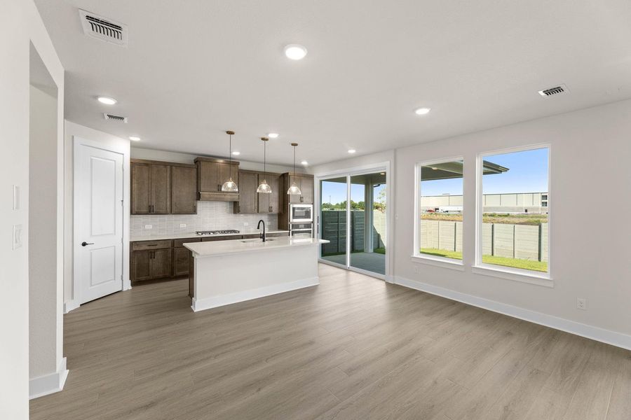 Spacious, unfurnished interior of a new home in Cottage Collection at Harvest, Argyle (Image 16).
