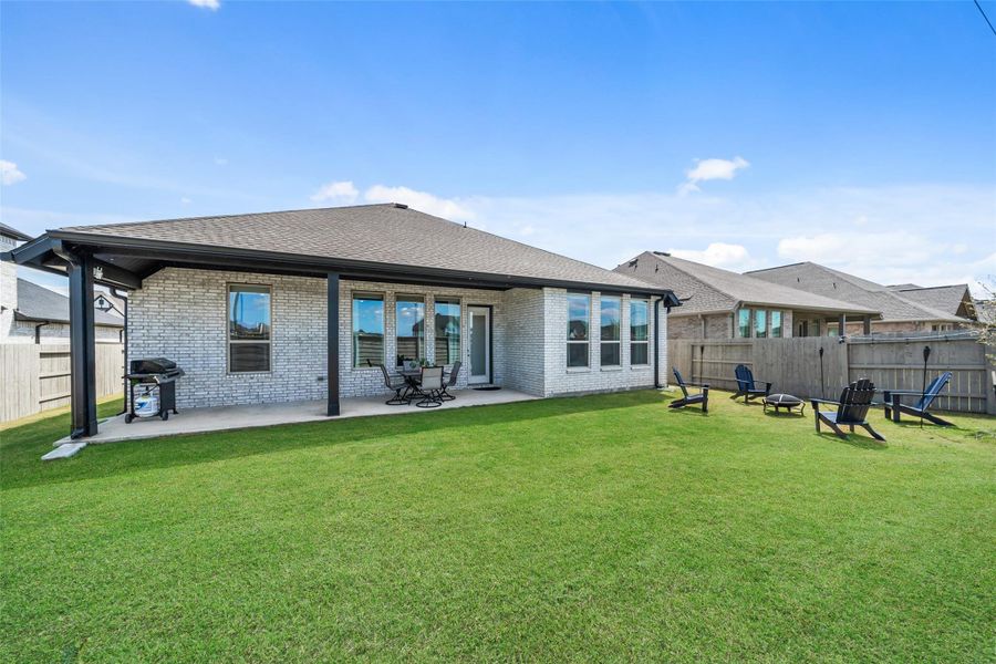 Exterior details and patio area of a home in Pomona, Manvel (Image 3).