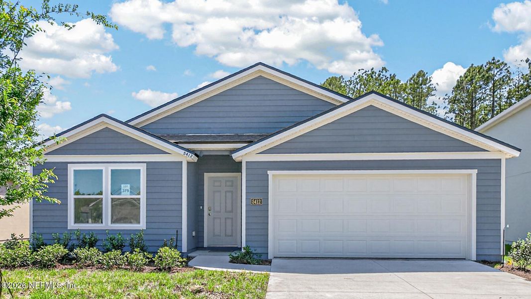 Front exterior of a new home in Copes Landing, Jacksonville, FL, highlighting curb appeal (Image 2). Front exterior of a new home in Copes Landing, Jacksonville, FL, highlighting curb appeal (Image 2).