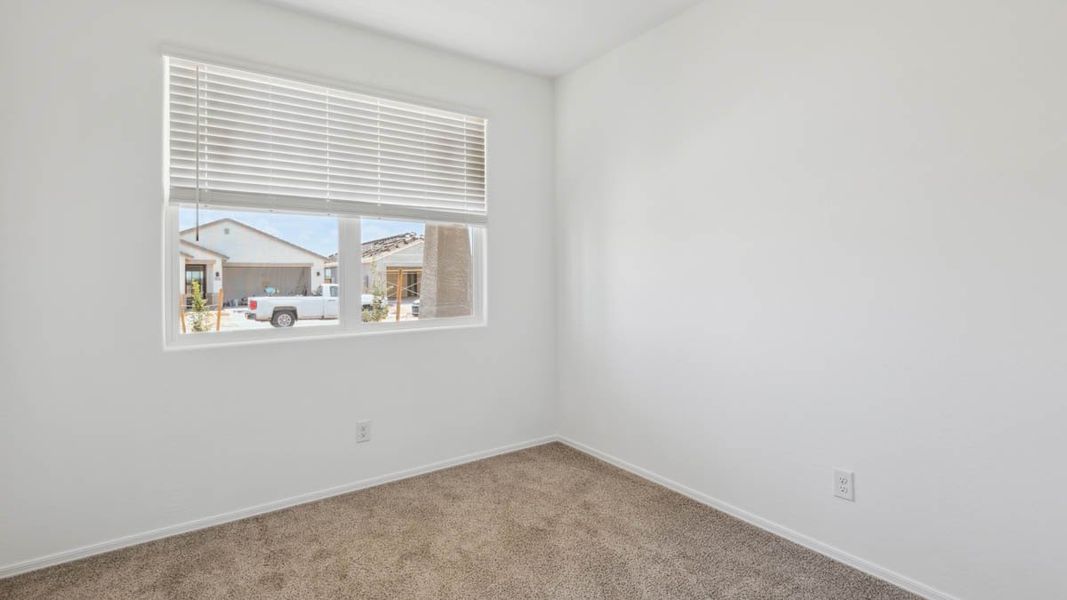 Representative unfurnished interior of a home built from the Puffin by D.R. Horton in Moonlight, Maricopa (Image 24).