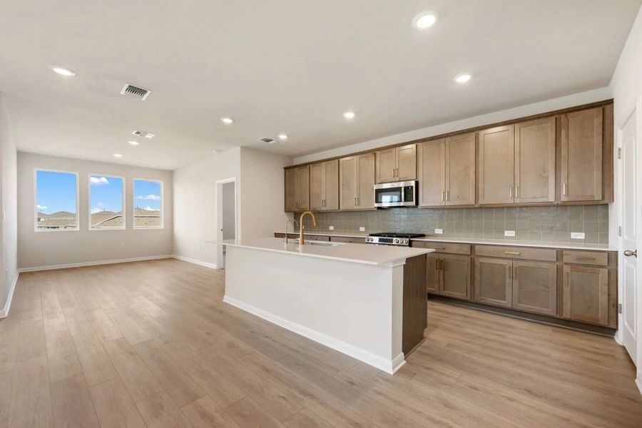 Furnished interior view inside a new home in The Colony, Bastrop (Image 7).