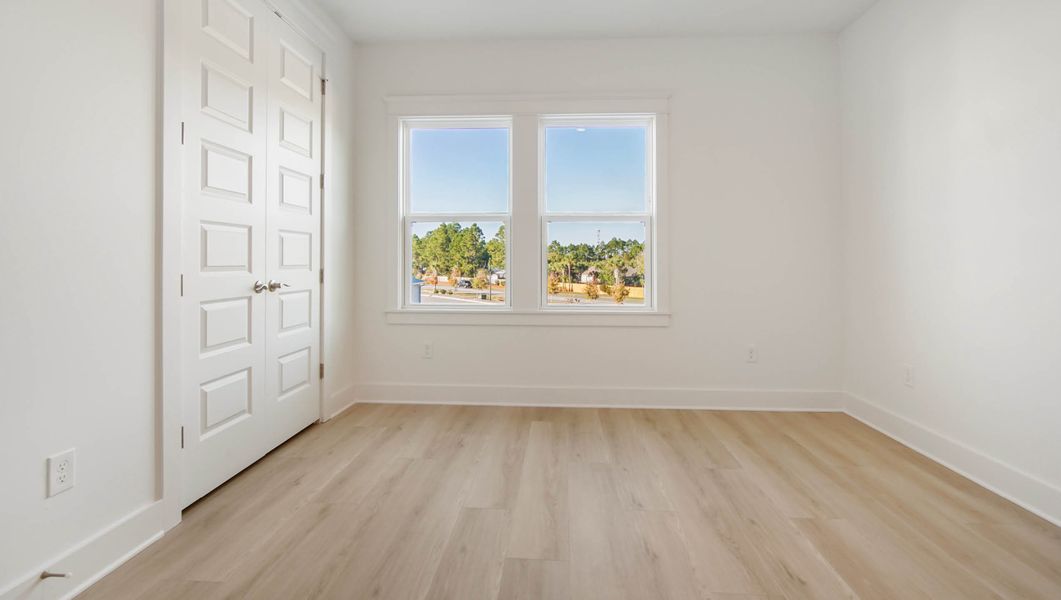 Representative unfurnished interior of a home built from the Ava by D.R. Horton in Parkside, Santa Rosa Beach (Image 41).