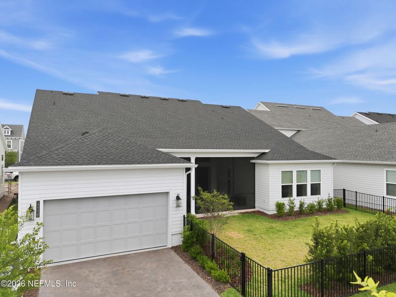 Front exterior of a new home in Seven Pines 70' Rear Entry, Jacksonville, FL, highlighting curb appeal (Image 30).
