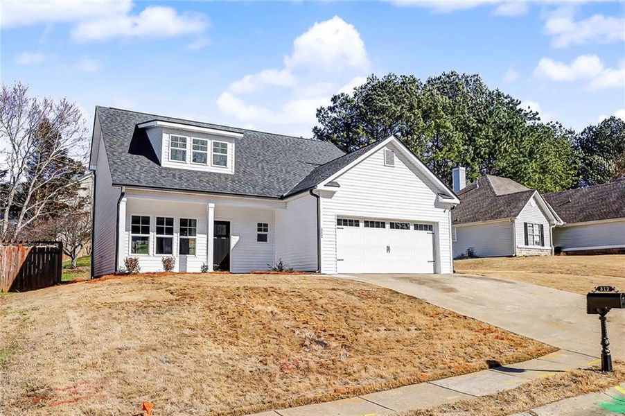 Front exterior of a new home in , Canton, GA, highlighting curb appeal (Image 16).