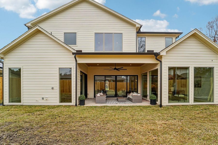 Exterior details and patio area of a home in , Houston (Image 24).