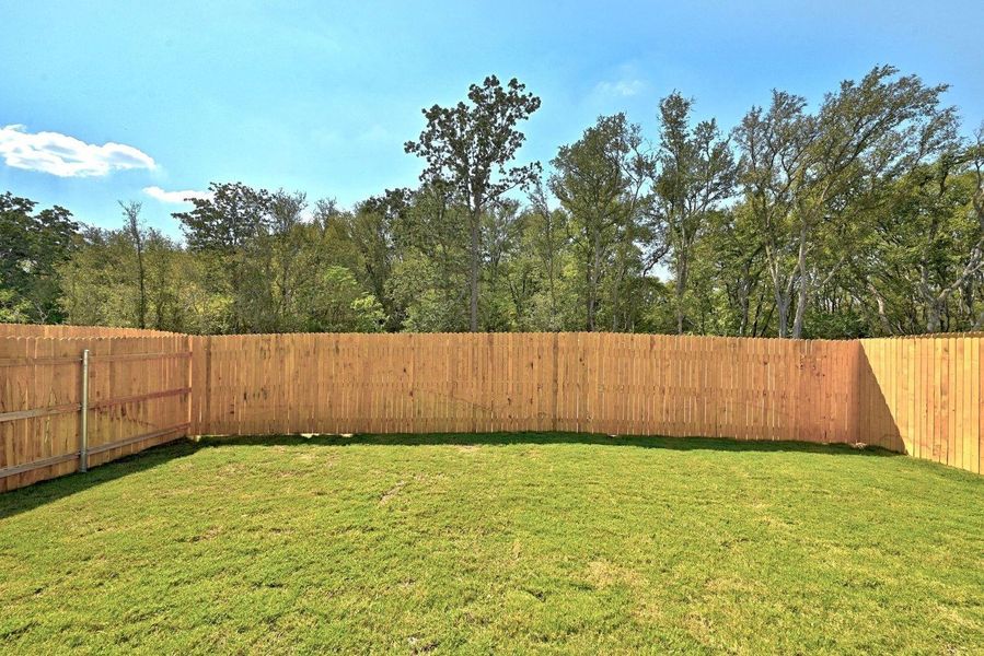Exterior details and patio area of a home in Trinity Ranch, Elgin (Image 22).