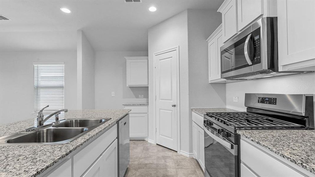 Furnished interior view inside a new home in Highlands at Chapel Creek, Fort Worth (Image 9).