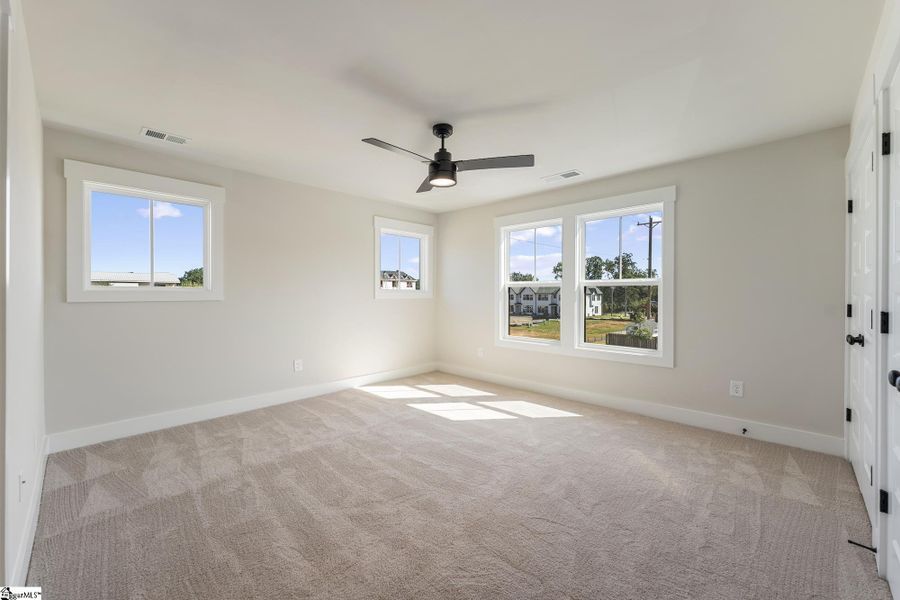 Spacious, unfurnished interior of a new home in Renaissance Place, Greenville (Image 11).