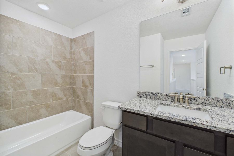 Representative furnished interior of a home built from the The Danbury I by Davidson Homes LLC in The Reserve at Potranco Oaks, Castroville (Image 6).
