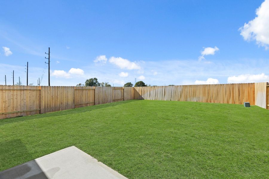 Exterior details and patio area of a home in Lonestar Collection at Paloma at Sanford Farms, Waller (Image 4).