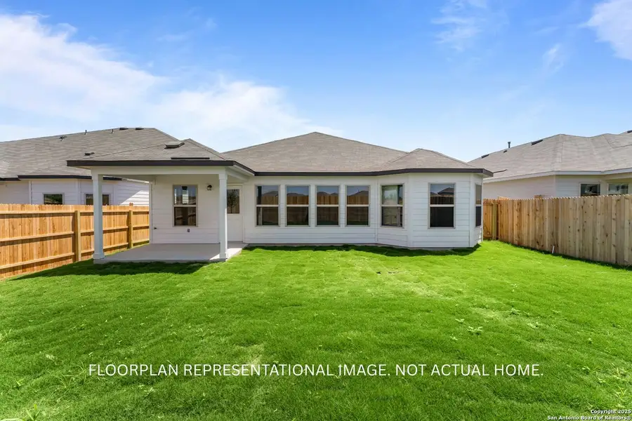 Exterior details and patio area of a home in Chaparral Ranch, Floresville (Image 2).