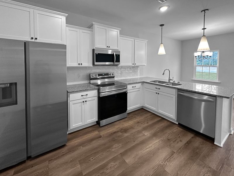Furnished interior view inside a new home in Grand Reserve, Hinesville (Image 7).