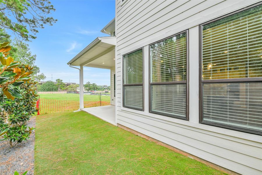 Exterior details and patio area of a home in Summer Place  35', Montgomery (Image 27).