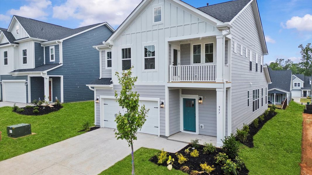 Front exterior of a new home in Pleasant Falls, Moore, SC, highlighting curb appeal (Image 2).